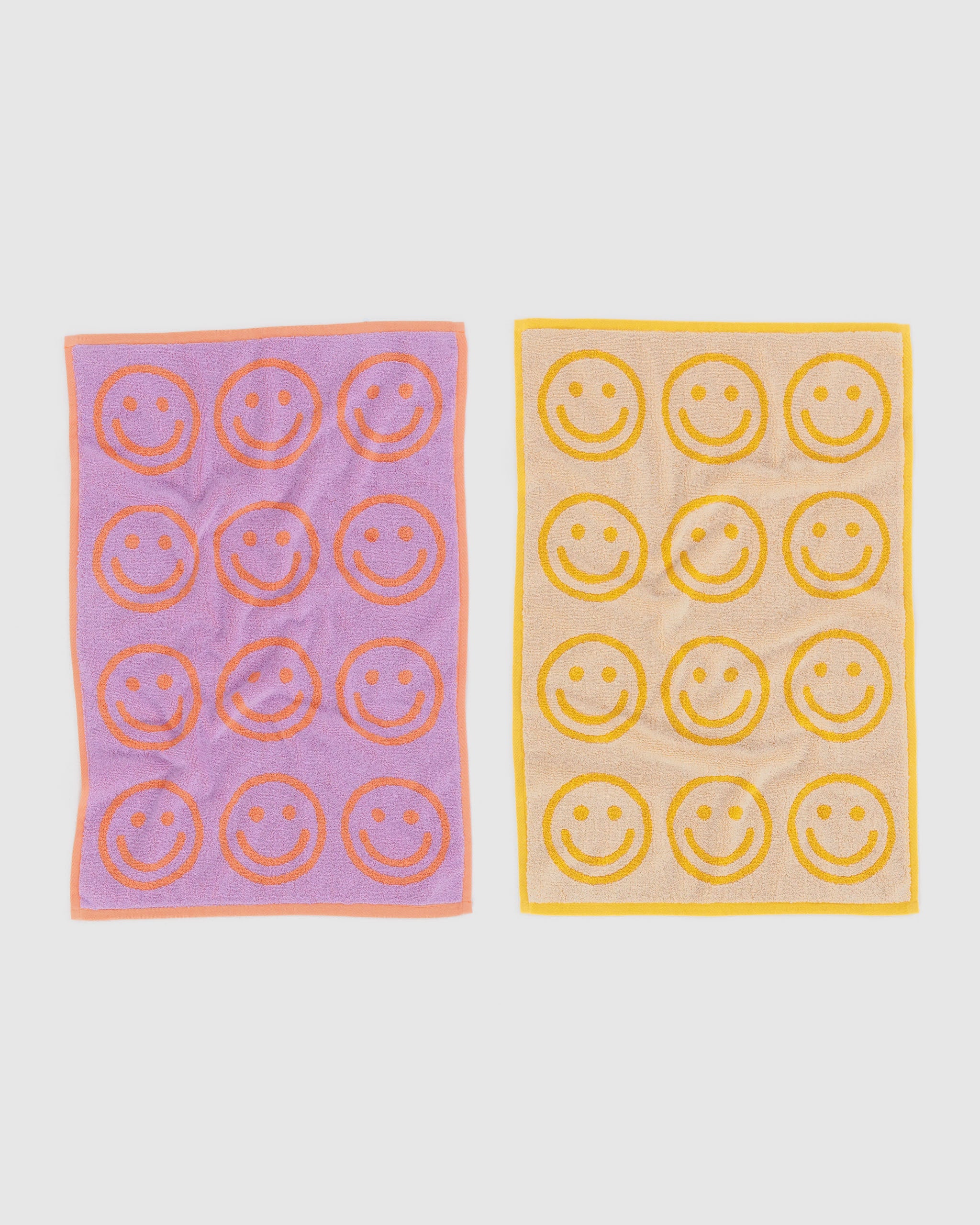 front-side-of-lilac-and-marigold-hand-towels-reversible-pattern-of-smiley-face
