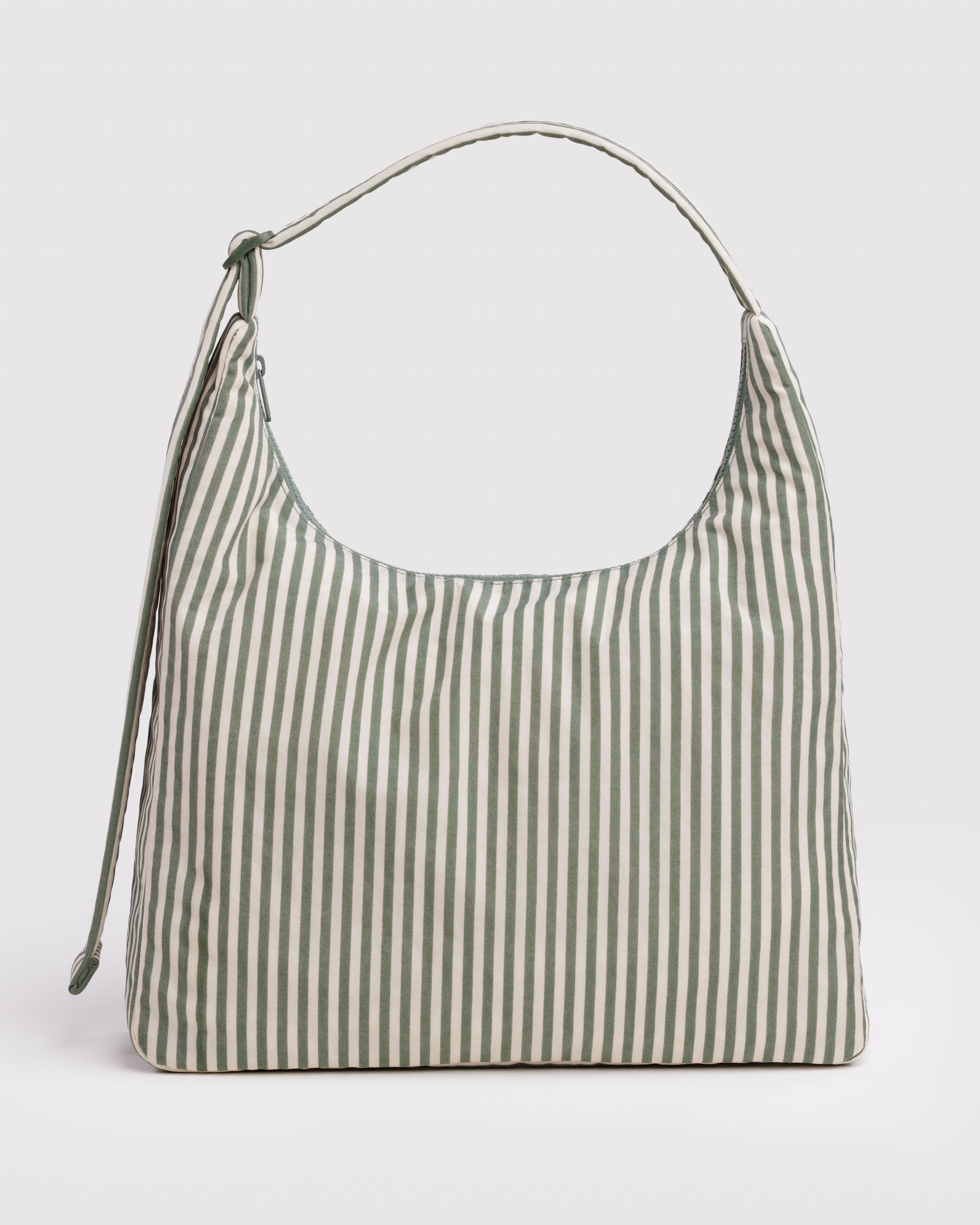 Green and cream striped handbag with adjustable shoulder strap.