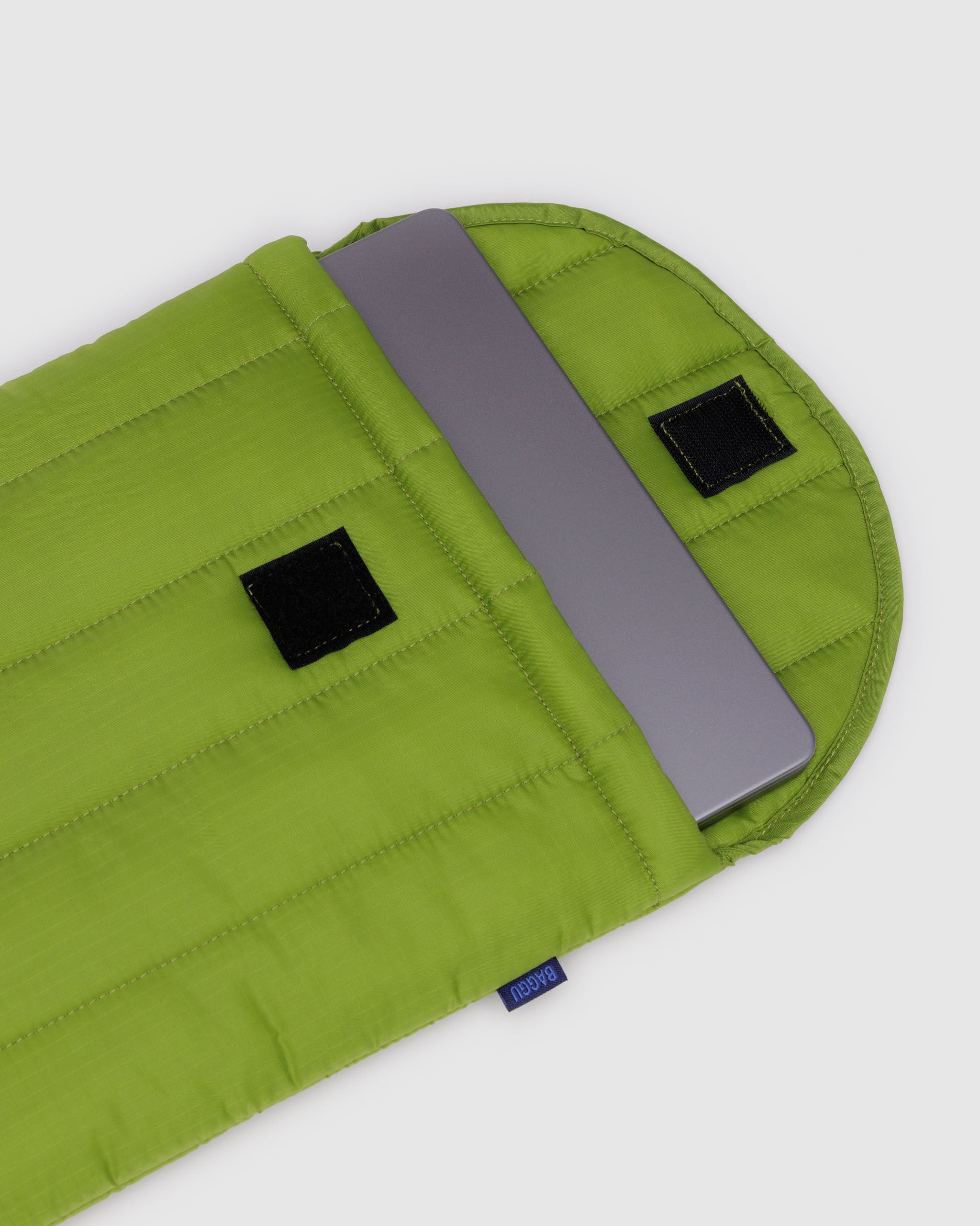 green-juice-puffy-laptop-cover-flap-open