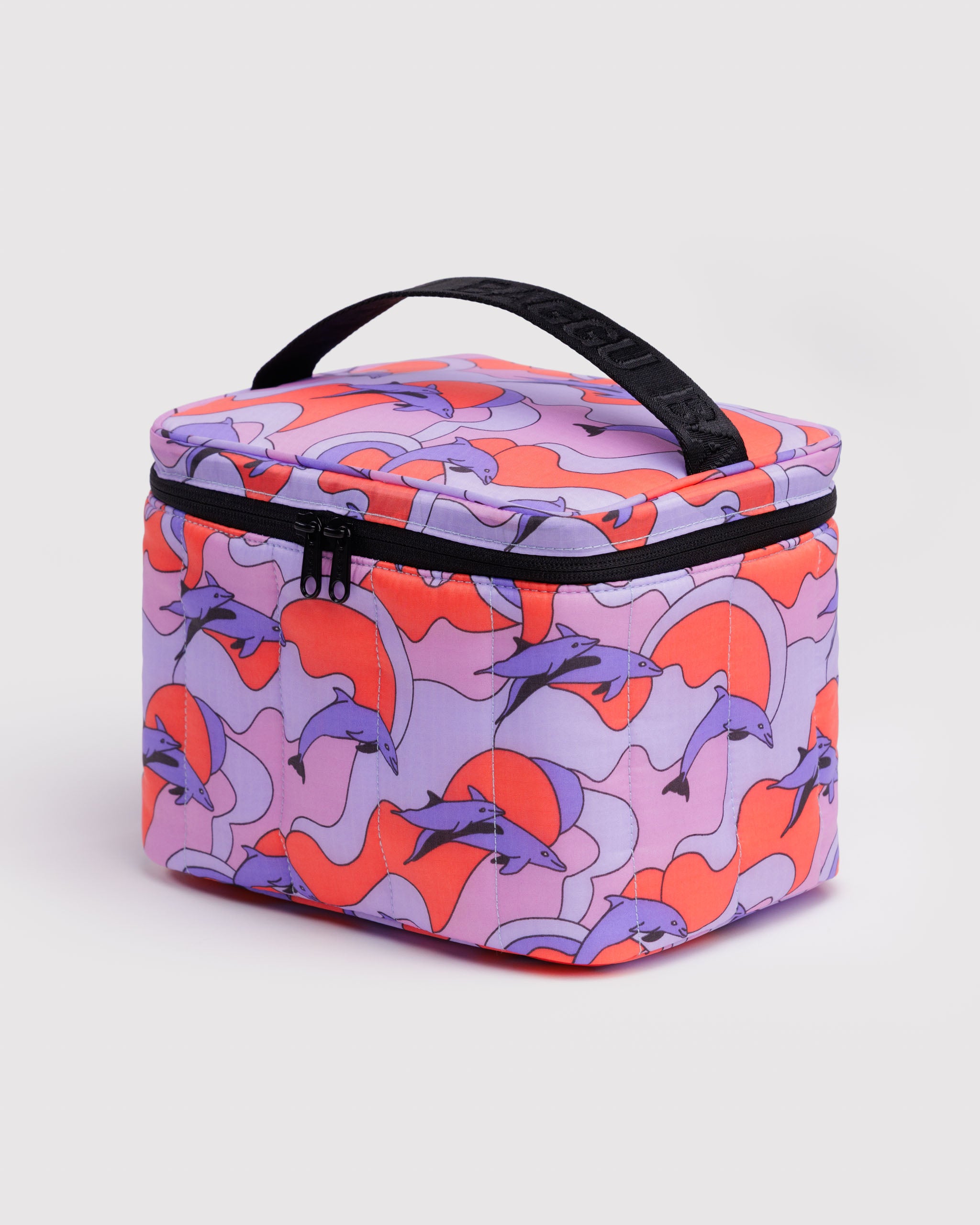 Lunch bag with dolphin pattern and black web handle and zip closure