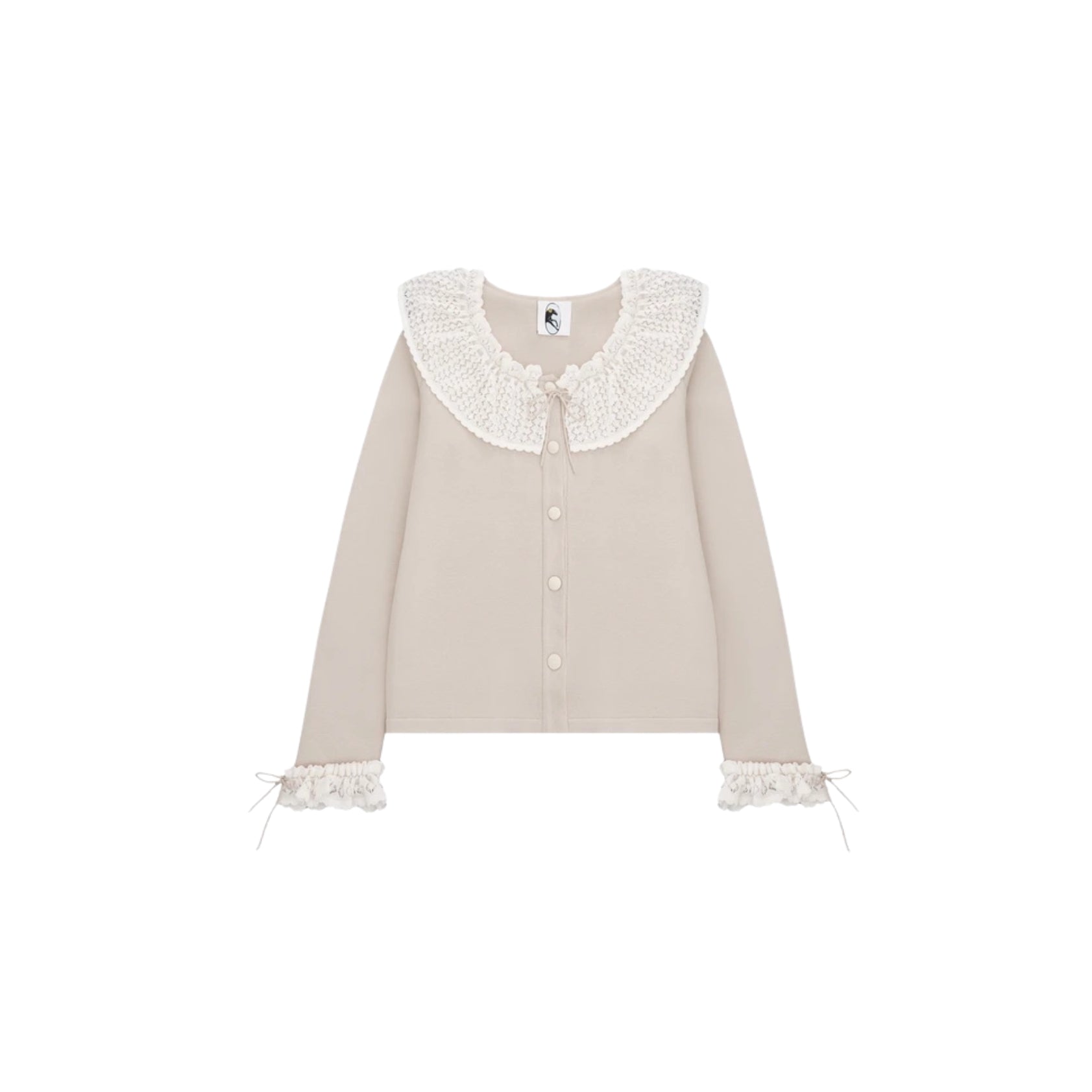 Beige cardigan with white lace details.