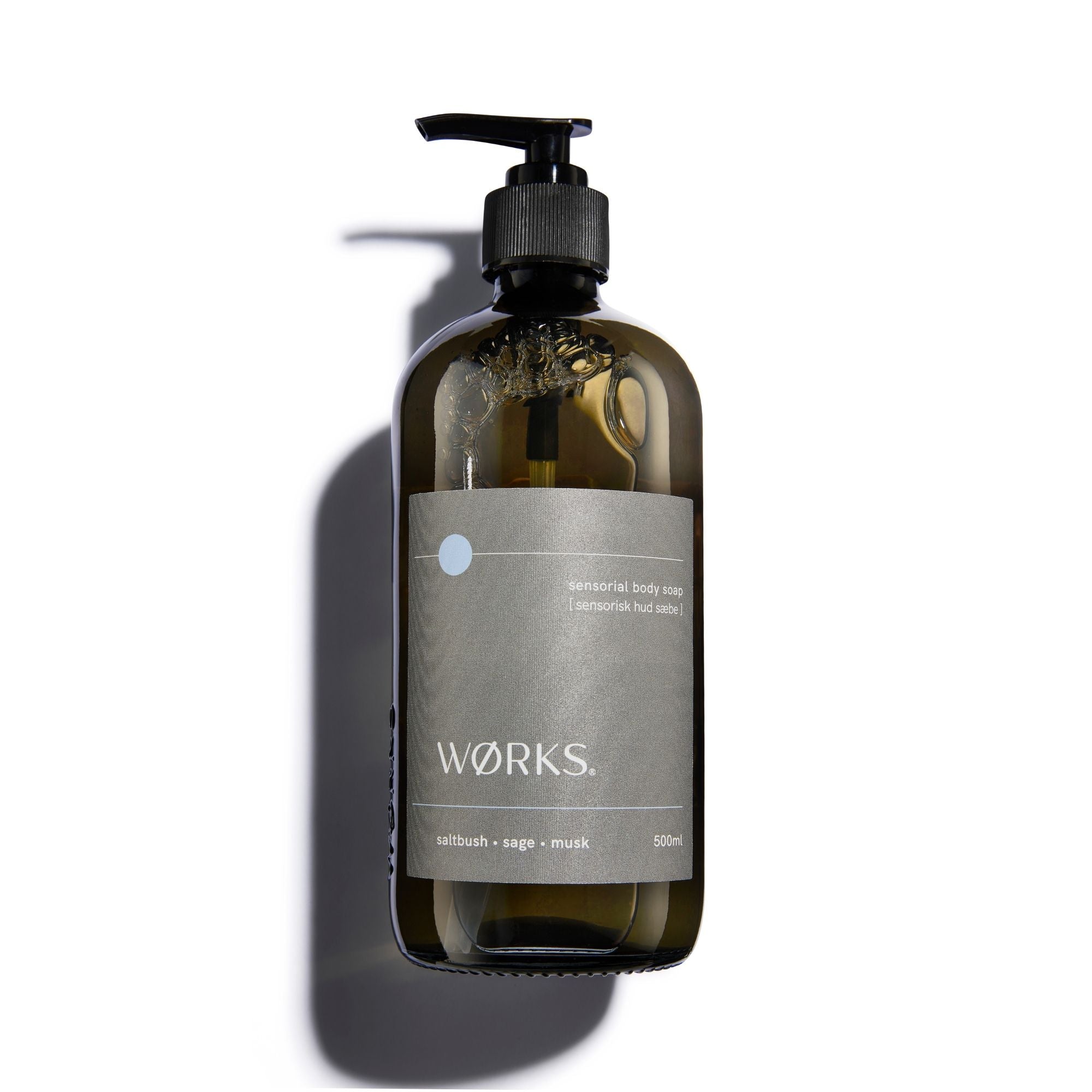 Brown bottle with pump and 'Works' label.