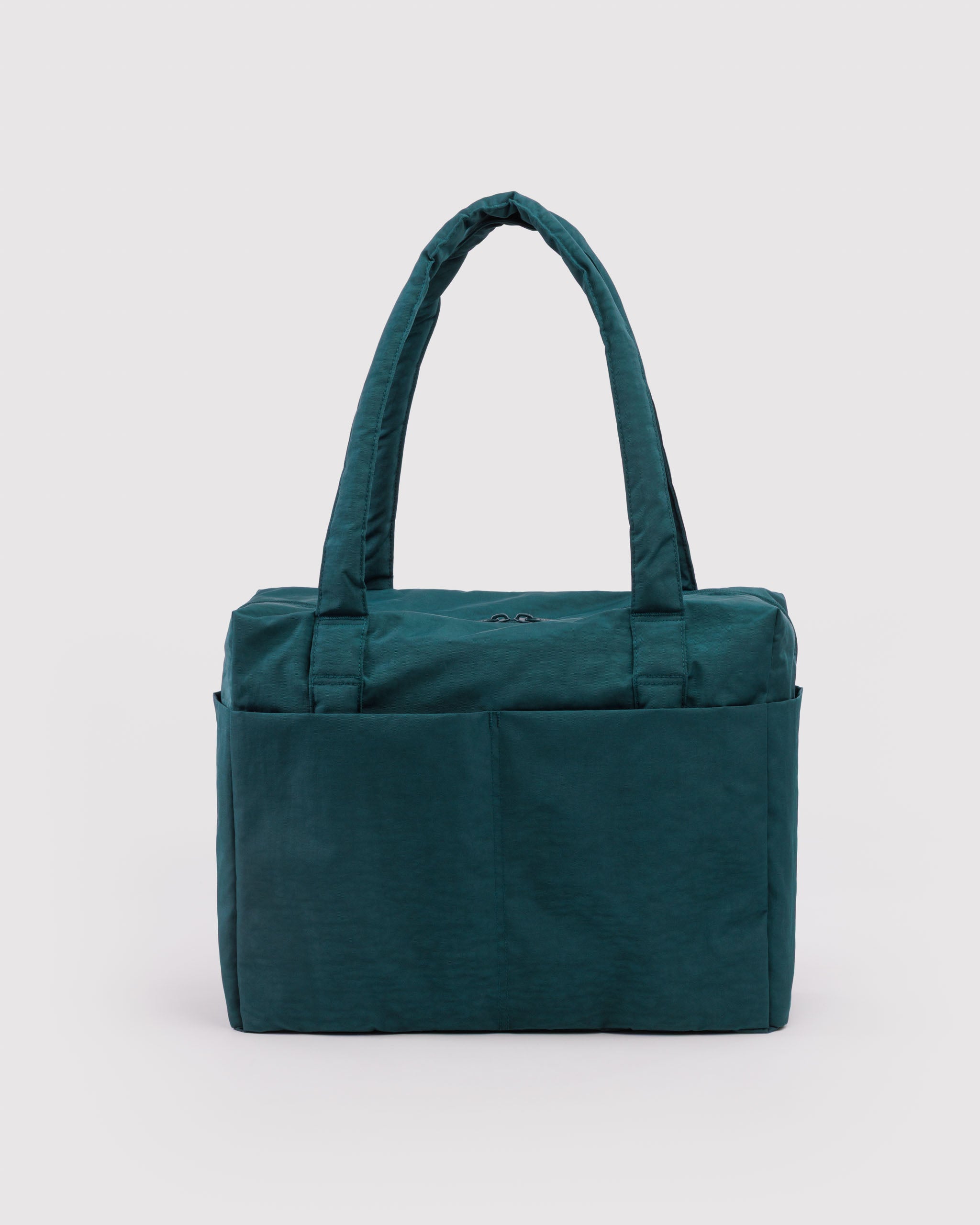 Teal tote bag with carry handles and outside pockets.