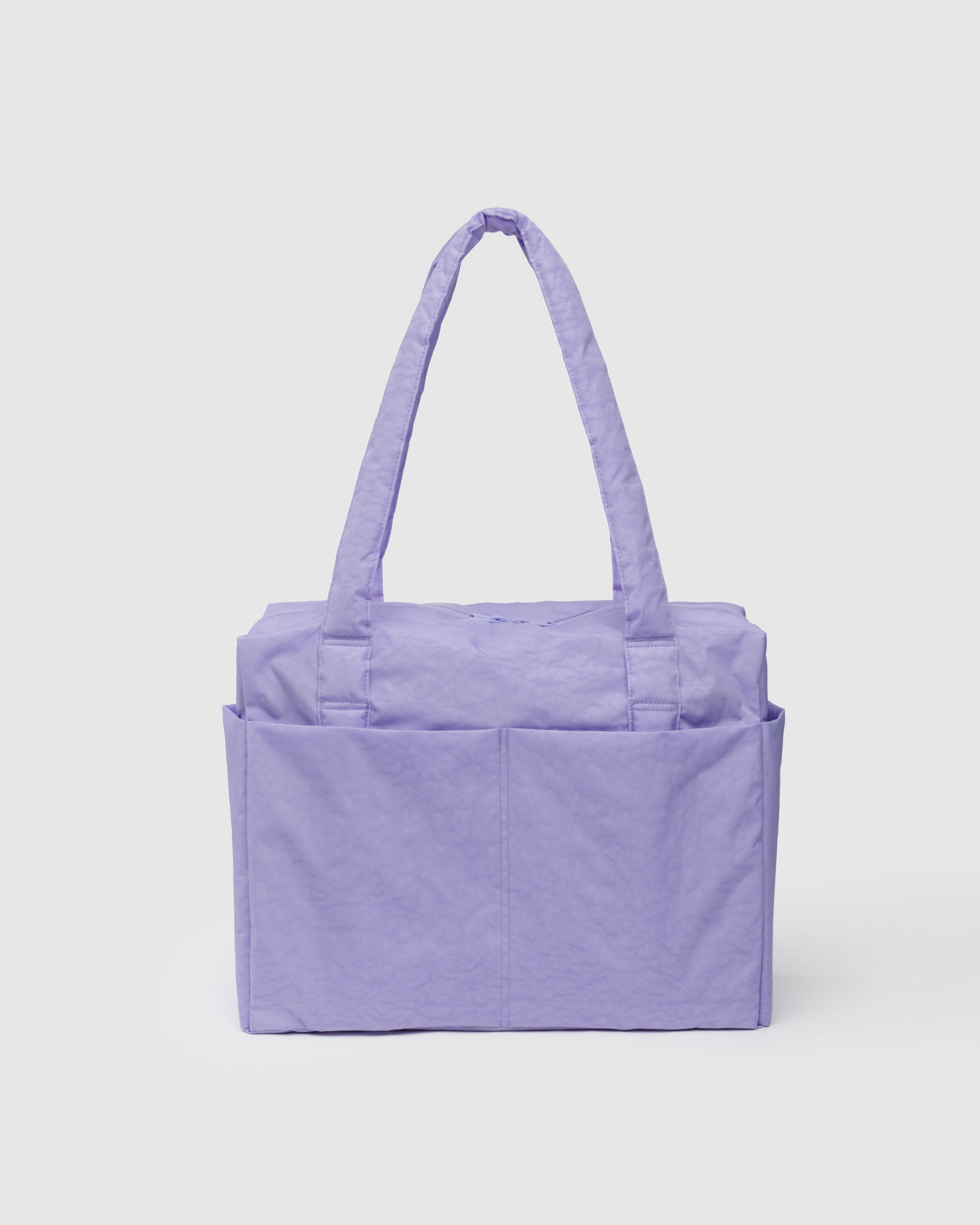 Purple duffle bag with a handle and external pockets.