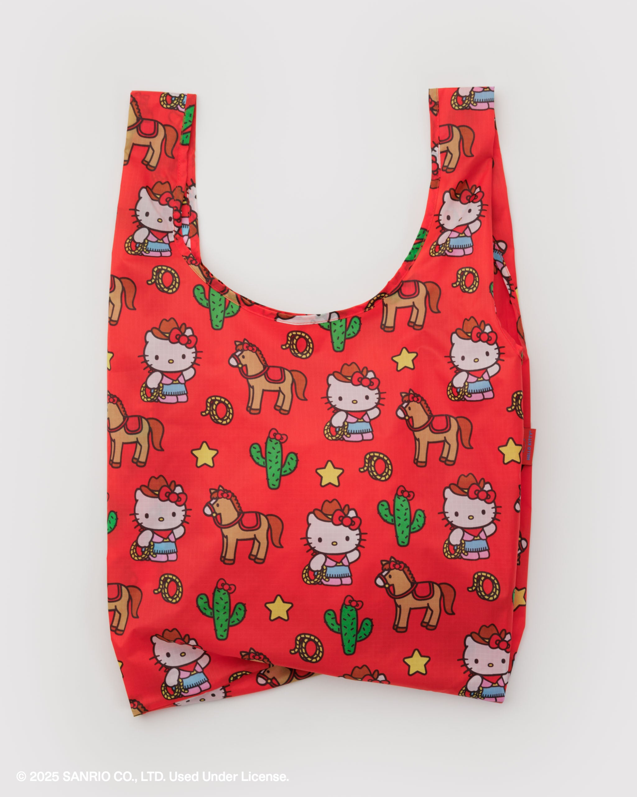 Red reusable bag with Hello Kitty and horse western pattern.