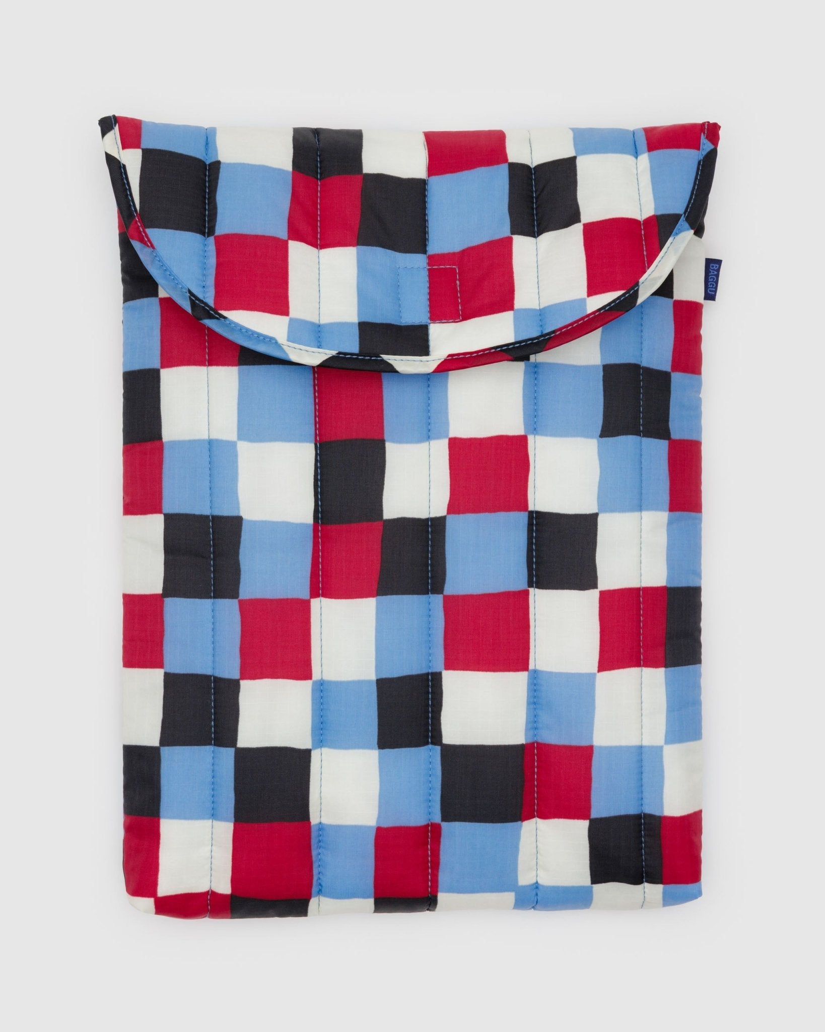 Checkered bag with red, blue, and black pattern 