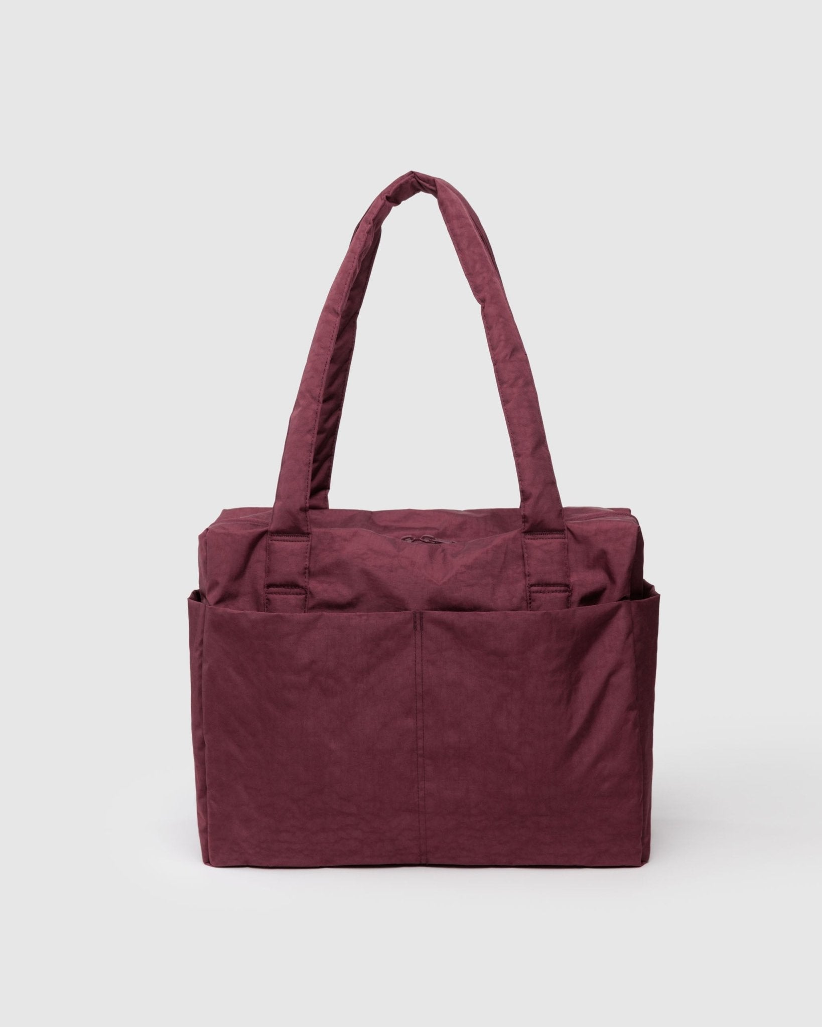 mahogany/burgundy small duffle with front pockets and carry handles