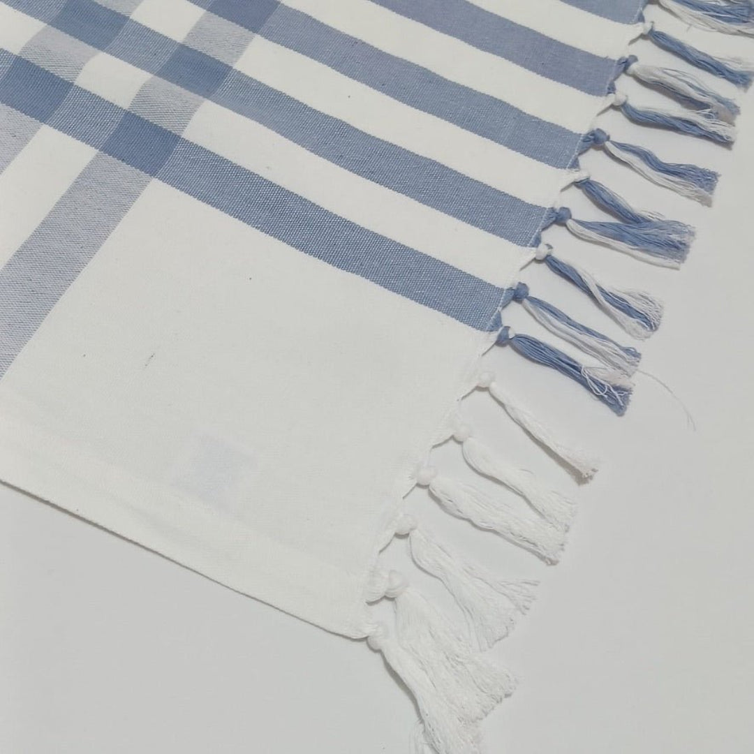 Hand knotted edge of light blue checked cotton tablecloth - ANNIE.G