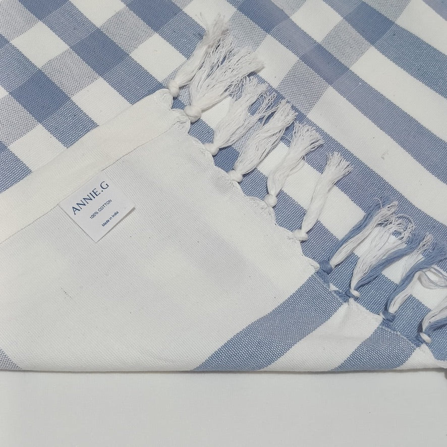 brand-label-in-hem-and-handknotted edge-on-periwinkle-coastline-check-cotton-tablecloth