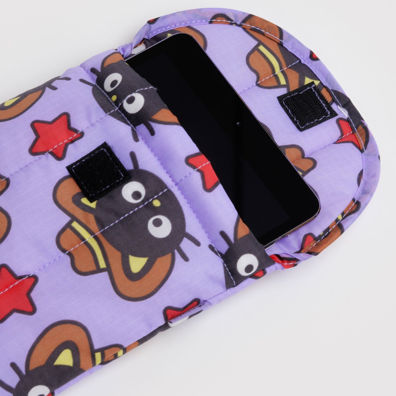 Quilted tablet case with chococat cartoon character design on a purple background