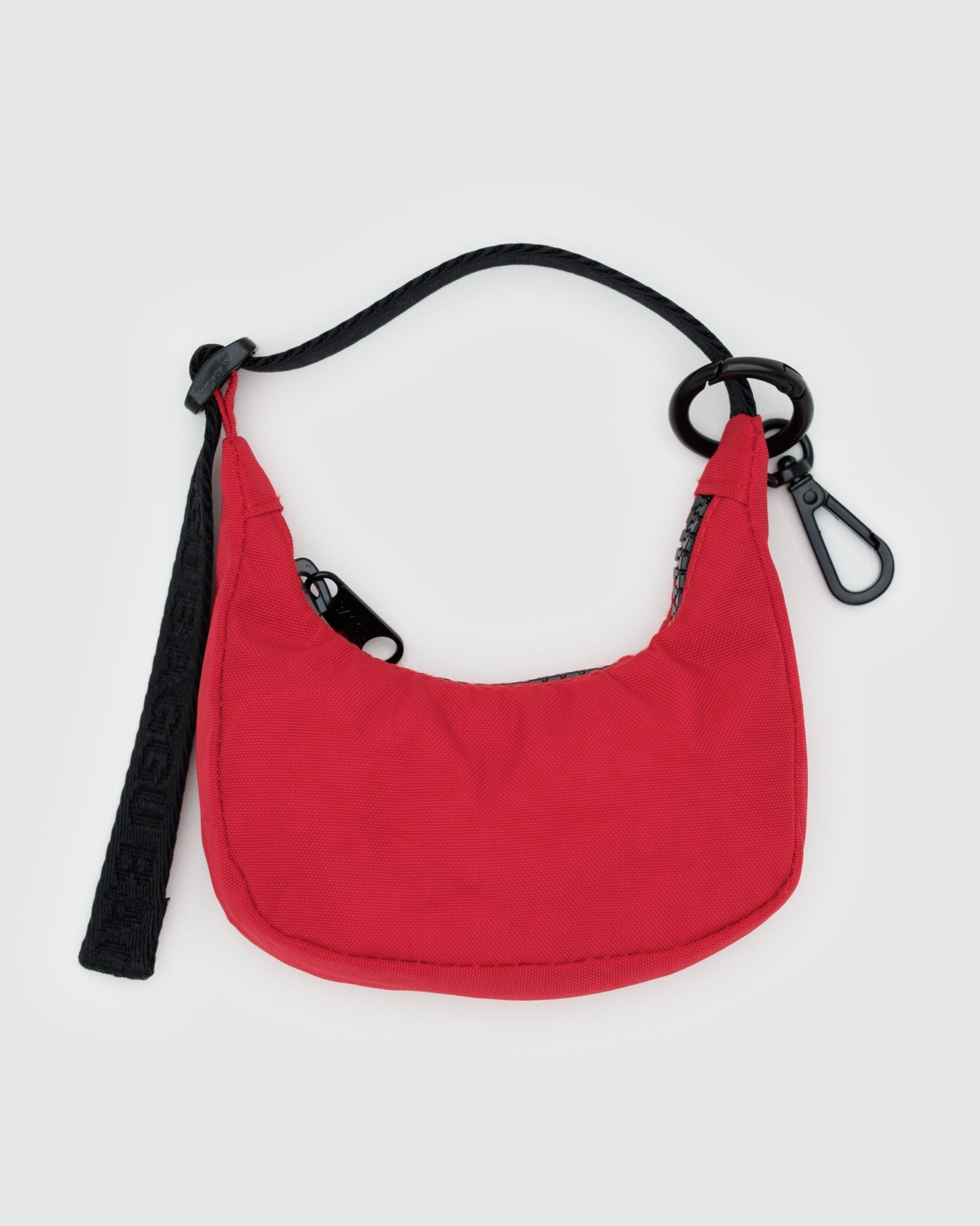 Red crescent shaped bag charm with black adjustable handle, zip and keychain - ANNIE.G