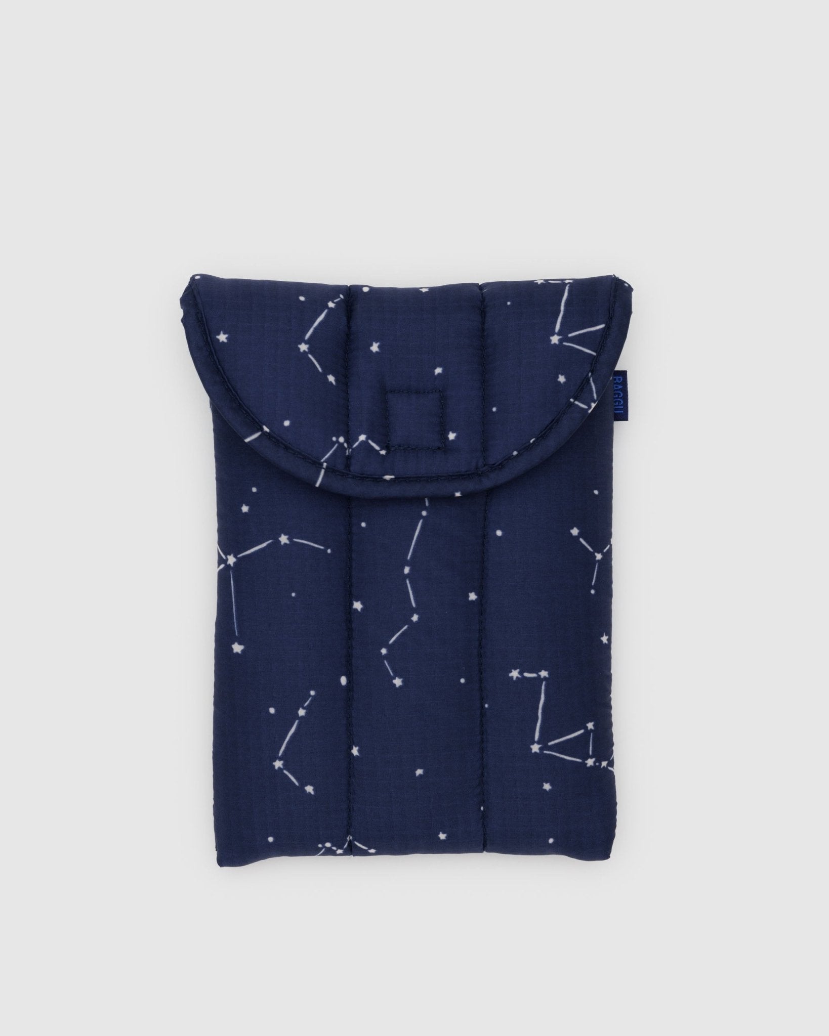 Navy with constellation prints on a Puffy Tablet Sleeve with BAGGU tag at side - ANNIE.G