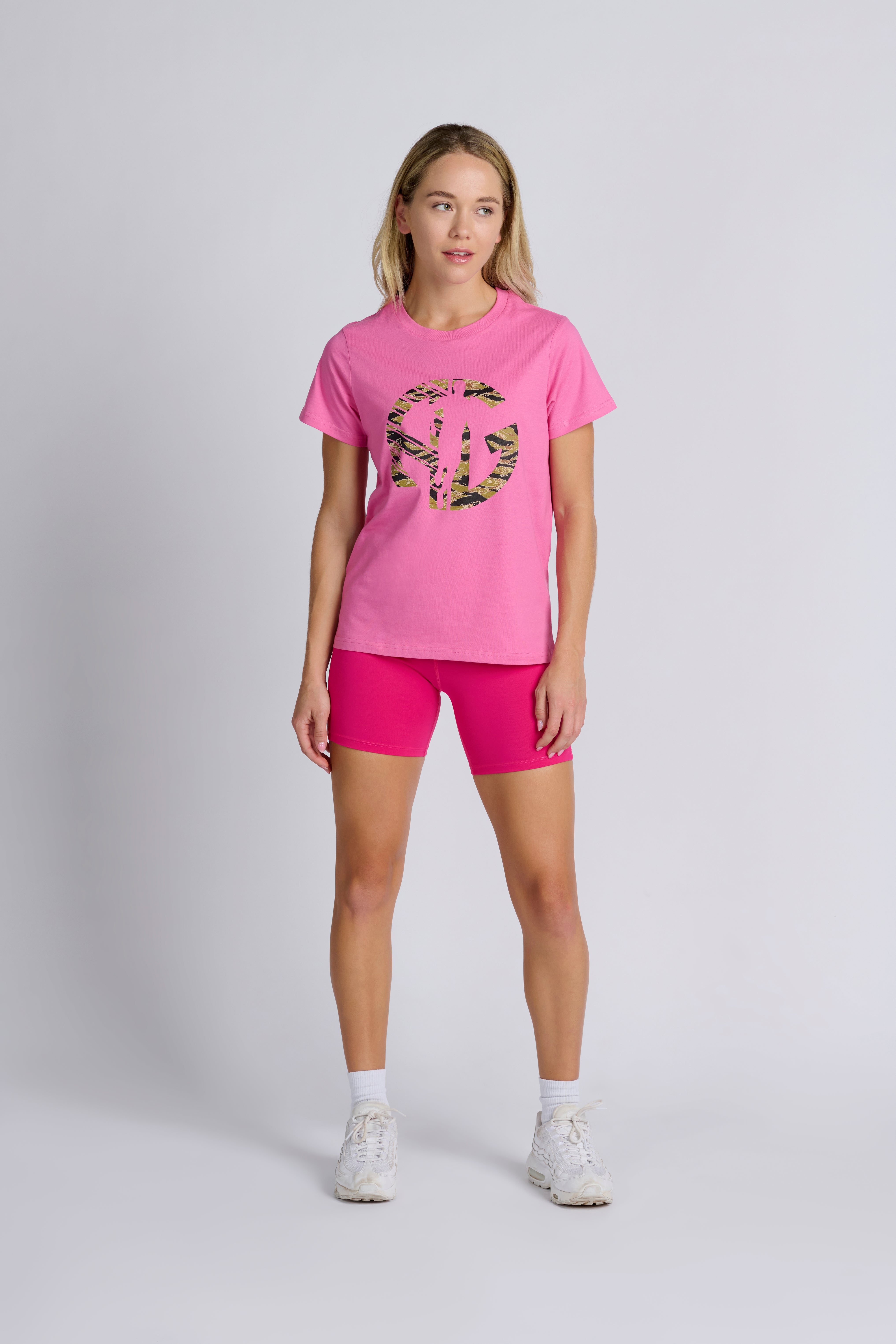 Woman-wearing-Camo-Womens-AG-Running-T-Shirt-in-charity-pink-and-pink-kate-bike-shorts