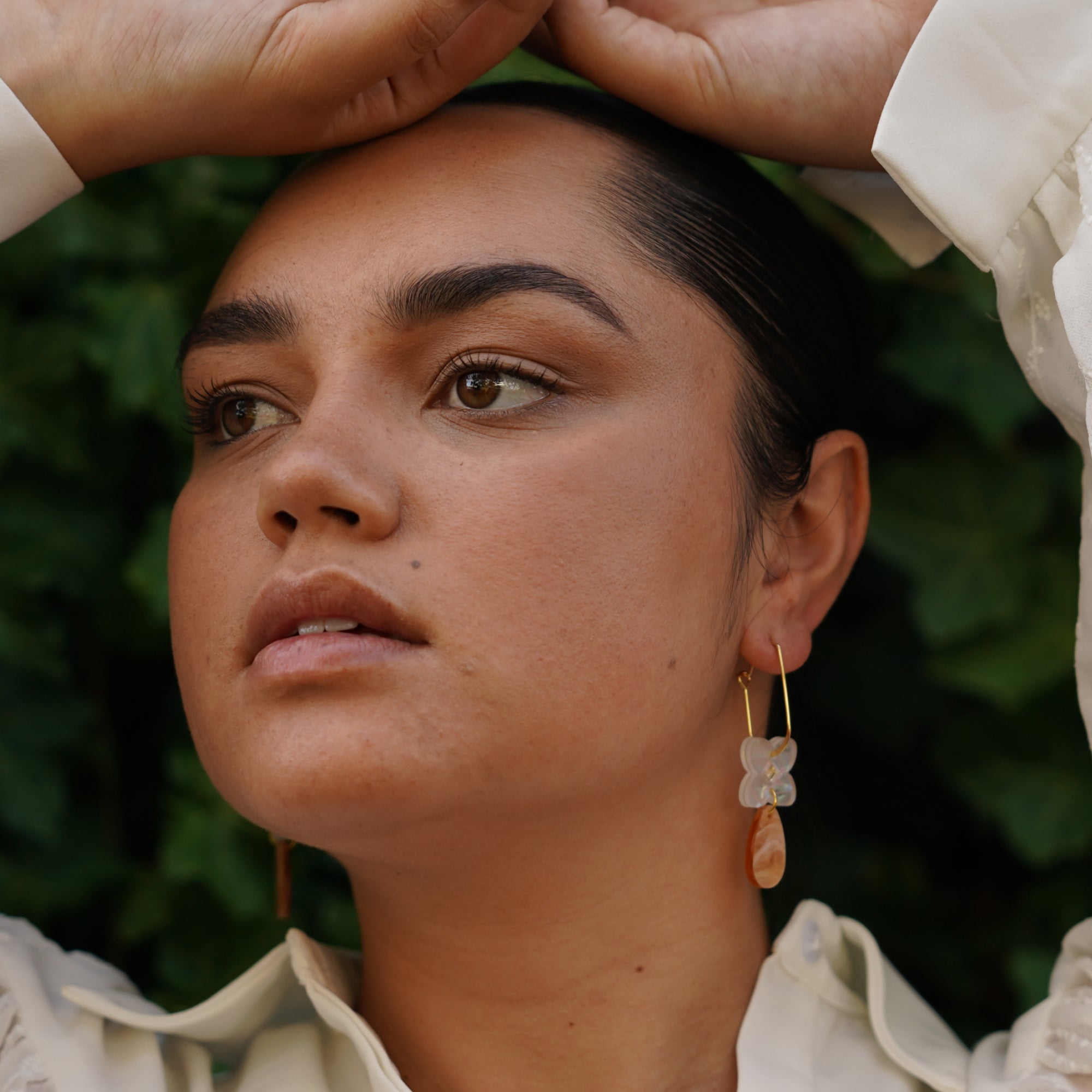 Woman wearing the honey Clover Tear Drop dangle earring - ANNIE.G