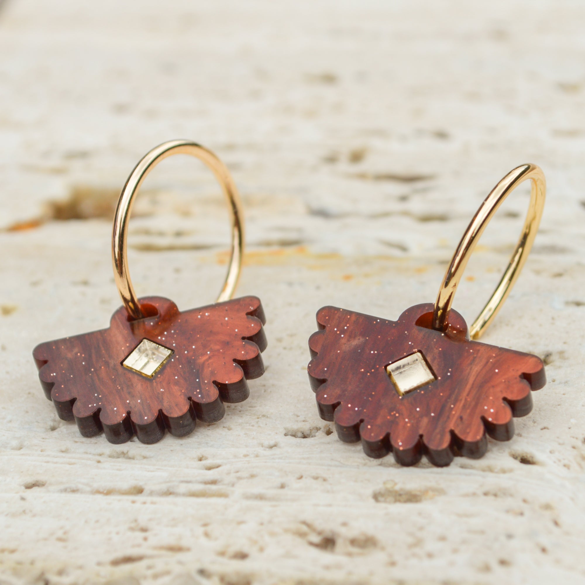 Sparkly chestnut fan shaped drop earrings with mirror diamond centre and gold small hoop.