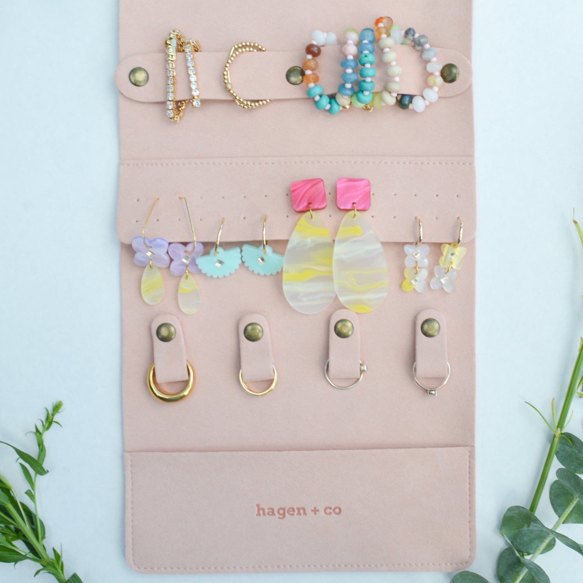 Jewellery in a pink Travel Wrap.