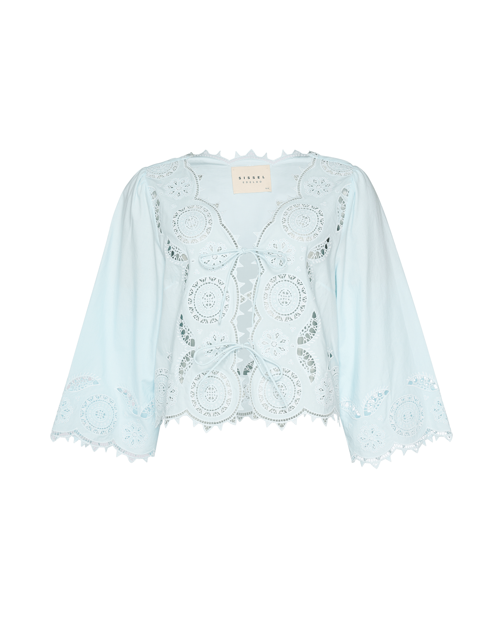 Front of a light blue top with cutwork embroidery, long sleeves with flared opening and two front ties - ANNIE.G