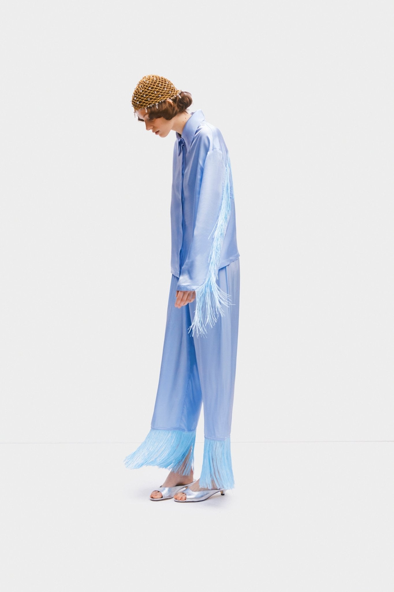 Person wearing blue Cosmic Cowboy Fringed Pyjama Setshowing fringe movement - ANNIE.G