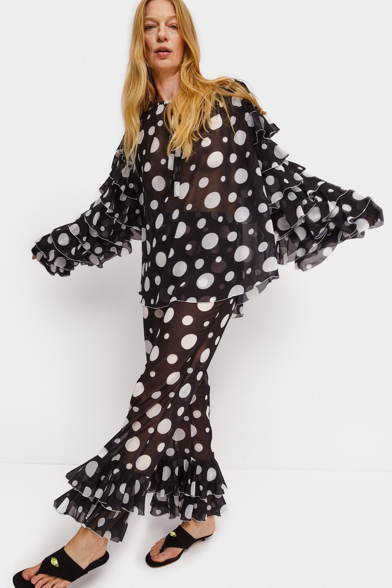 Woman wearing Samba Ruffled Chiffon Polka - dot Top and Pants in Black and top - ANNIE.G
